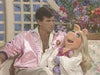 George Hamilton is uncomfortable with Miss Piggy’s romantic inclinations on her TV special “The Fantastic Miss Piggy Show. It aired on Sept 17, 1982 on ABC.
