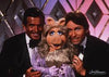 A romantic triangle developes between guest stars John Ritter (Three's Company), actor George Hamilton and Miss Piggy on her television special "The Fantastic Miss Piggy Show" that aired Sept 17, 1982 on ABC. 