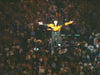 This Is Garth Brooks, Too! – NBC special 5/6/94 Garth flies over the heads of the crowd to the farthest reaches of the stadium while performing “Ain’t Goin’ Down Till the Sun Comes Up.  The concert DVD is available from RewatchClassicTV.com