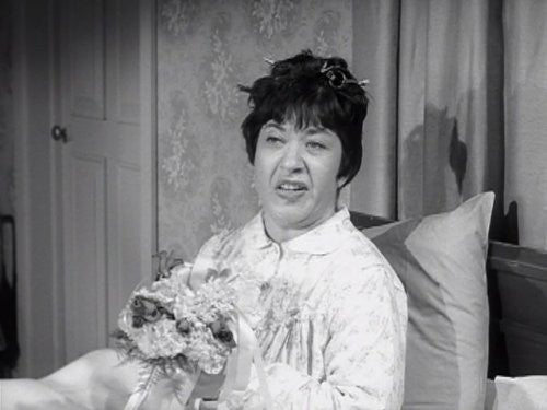 Charlotte Rae as Sylvia Schnauzer on the 1960s sitcom Car 54, Where Are You? (1961). Visit www.RewatchClassicTV.com to get the Charlotte Rae episode DVD collection set.